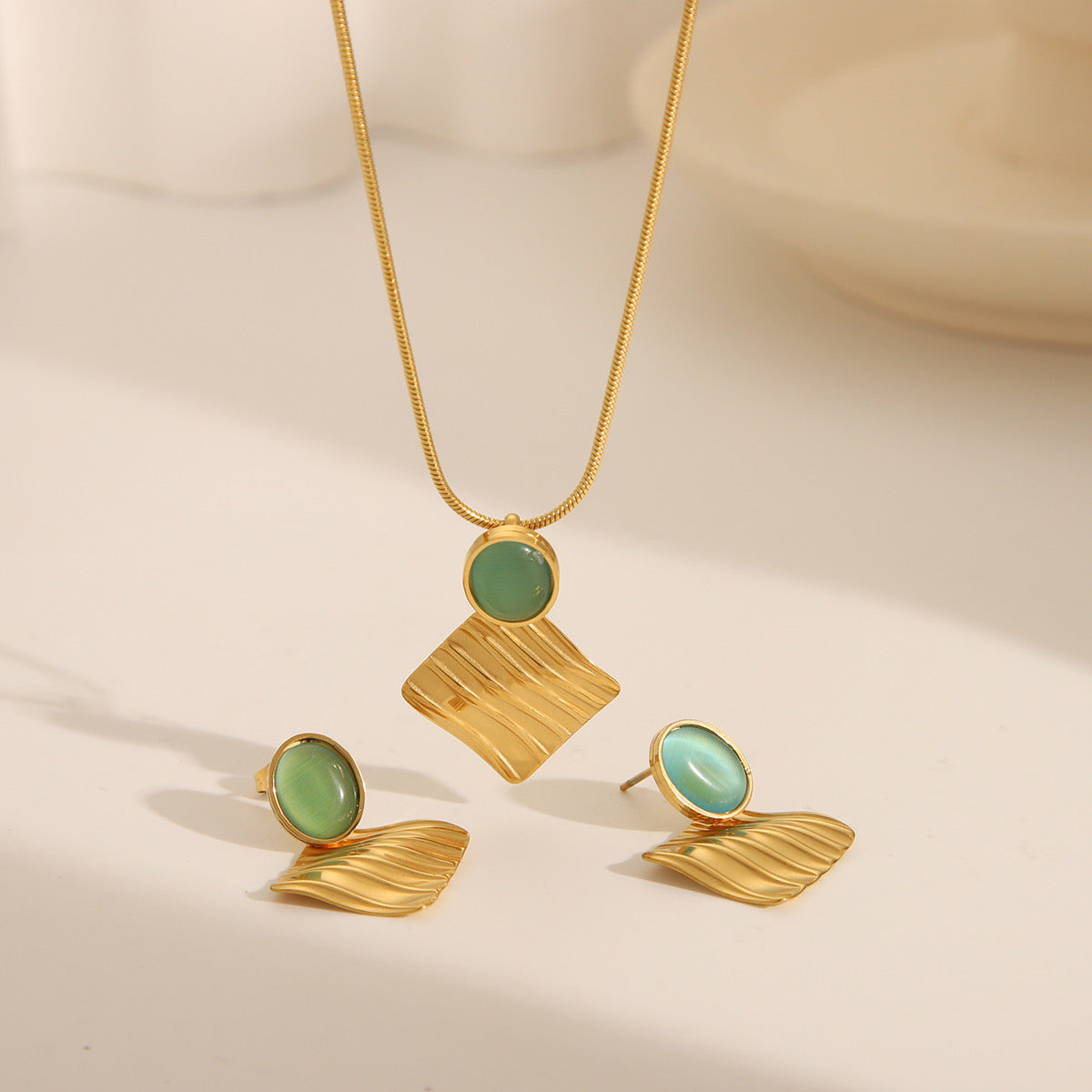 Luxe Emerald Leaf Earrings